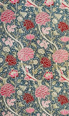 a blue and pink floral print fabric with red flowers on the bottom half of it