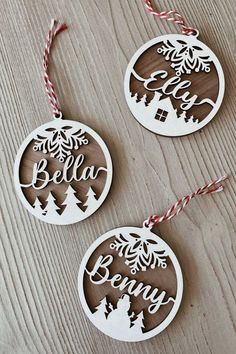 two wooden ornaments with the words be merry hanging from them