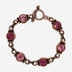 Glimmering, faceted round stones enhance in polished casting link together to create this elegant and bright toggle bracelet. A fun and fabulous accessory that goes great with any outfit. Circumference: 7 InchJewelry Closure: Toggle ClaspStone Cut: RoundMetal Color: Rose ToneChain Length: 7 InchChain Construction: LinkCare: Wipe CleanStone Type: 6 CrystalBracelet Type: Strand BraceletsMetal: AlloyCountry of Origin: Made in US Bracelets Purple, 1928 Jewelry, Rose Tone, Unlimited Money, Pretty Jewelry, Toggle Bracelet, Strand Bracelet, Pretty Jewellery, Costume Design