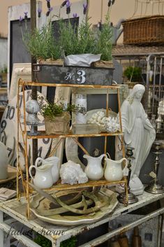 an assortment of vases and other items on display