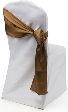 a white chair with a gold sash on it's back and the seat cover folded down