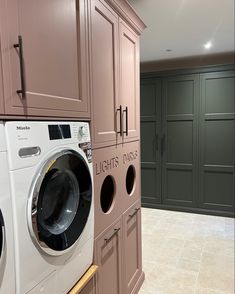 A pink and green ‘bootility’ Sulking Room Pink Utility, Pink Utility Room Ideas, Pink Boot Room, Pompeian Ash Little Greene, Sulking Room Pink Kitchen, Pink Utility Room, Large Utility Room Ideas, Pink Laundry Room Ideas, Utility Room Cabinets