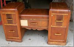 an old wooden desk with two drawers