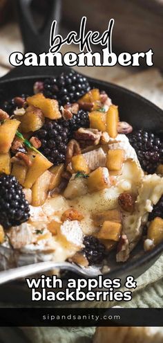 a bowl filled with fruit and nuts on top of a table