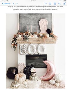 a mantel decorated with pumpkins, candles and decorations