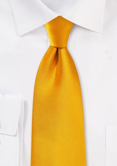 You can elevate your look by adding this tastefully handcrafted necktie in a golden saffron colour. Its perfect smooth finish and eye-catching color make for a style that will leave a lasting impression. This tie adds flair and sophistication, making it a popular choice for weddings with a Great Gatsby-inspired theme. Pair it with dark-colored tuxedos and slay the day. Classic Neckwear Standard Tie For Gift, Classic Gold Tie For Formal Occasions, Elegant Gold Ties For Business, Classic Yellow Ties For Office, Gold Standard Tie For Business, Classic Gold Tie And Suit Accessories, Elegant Yellow Ties For Formal Occasions, Elegant Yellow Tie For Formal Occasions, Elegant Orange Tie For Business