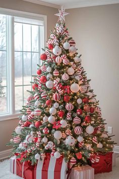 a christmas tree with red and white ornaments