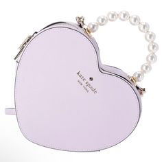 2.36" W X 7.09" H X 8.19" D Handle Drop: 2.5" Strap Drop: 22" Metal Pinmount Logo Closure Type: Zip Closure Dust Bag Included: No Interior: Front Slip Pocket Saffiano Leather Lining: Two Way Script Logo Lining Leather Heart, Tory Burch Handbags, Heart Bag, Kate Spade Bag Crossbody, Black Leather Wallet, Kate Spade Purse, Leather Crossbody Purse, Mini Crossbody Bag, Black Cross Body Bag