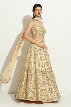 Buy Ivory Dupion Silk Embroidered Mirrorwork V-neck Floral Jaal Lehenga Set For Women by Vandana Sethi Online at Aza Fashions. Semi-stitched Bollywood Choli In Beige, Bollywood Style Beige Choli With Intricate Embroidery, Bollywood Style Beige Choli With Resham Embroidery, Bollywood Style Beige Lehenga For Navratri, Traditional Cream Lehenga With Mirror Work, Bollywood Style Floor-length Beige Choli, Bollywood Style Cream Lehenga, Bollywood Style Beige Floor-length Choli, Beige Bollywood Floor-length Choli