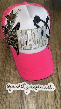 Show your support in style with our custom cheer mama hat! Perfect for proud cheerleading parents, this hat features a unique design that can be personalized to reflect your cheer squad's colors or your child's name. Made from high-quality materials, it offers comfort and durability, making it ideal for game days or practice sessions. Whether you're in the stands or on the sidelines, this hat is a fantastic way to cheer on your little athlete while looking fabulous! Personalized Pink Trucker Hat, Personalized Pink Snapback Trucker Hat, Trendy Customizable Pink Baseball Cap, Customizable Pink Trucker Baseball Cap, Customizable Pink Baseball Cap, Adjustable Pink Trucker Hat For Sports Events, Pink Adjustable Trucker Hat For Sports Events, Girls Cap, Mama Hat