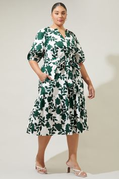 Step out in an evergreen, floral state of mind. Sweet, green floral motifs sit against a cool and crisp, white-ground to shape the Wynette Dress. A shift maxi with bubble sleeves that frame a functional button front dress. It maintains a sheath silhouette, with a sash style belt to add shape.The buttons end where they meet a bottom tier split.- Breathable - Belted- Button front- Pockets- Color: White ForestSize + Fit - Model is 5'8" and wearing size XS- Measurements taken from size S - Chest: 26 Tiered Midi Dress, Button Front Dress, State Of Mind, Floral Motifs, Cotton Style, Floral Motif, Nice Dresses, Fitness Models, Color White