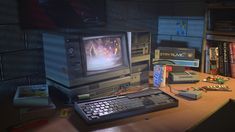 an old computer sitting on top of a wooden desk