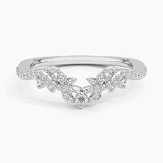 a white gold ring with diamonds on it