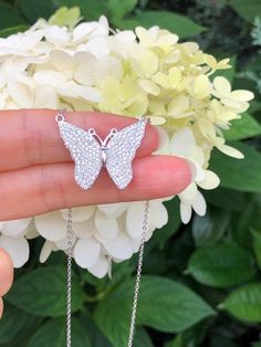 925 Sterling Silver Cz Butterfly Pendant Necklace  - Metal: 925 Sterling Silver 925 (Finish: Rhodium Plated) - Stone: Clear Cubic Zirconia, Pave - Shape: Butterfly - Pendant Dimension: 25mm(0.98 in) x 21mm(0.83 in), Thickness 1mm - Light Cable Chain: 16.75" adjustable (14.75" + 1" + 1"), Lobster Clasp - Color: Silver Silver Sparkling Diamond Necklace In Fine Jewelry Style, Cubic Zirconia Necklaces With Pave Setting As Gift, Gift Cubic Zirconia Necklaces With Pave Setting, Cubic Zirconia Necklaces With Pave Setting, Silver Cubic Zirconia Diamond Necklace For Gift, Cubic Zirconia Necklace In Silver With Pave Setting, Sparkling Silver Cubic Zirconia Diamond Necklace, Sterling Silver Diamond Necklace With Pave Setting, Silver Cubic Zirconia Necklace With Pave Setting