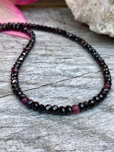 "unisex black spinel and rad garnet natural gemstones necklace, free shipping - gifts to her - gift for him - healing gemstones necklace - everyday beaded necklace - fashion necklace This beautiful, natural, classic gemstone necklace, shines and sparkles as much as black diamond necklaces. This necklace is for both men and women. Product Details ◈ Handmade to order in the USA ◈ Black spinel and rad garnet: Natural rondelle gemstone about 4mm faceted cut beads and 4mm dark garnet beads ◈ Sterling Garnet Black Jewelry For Gift, Black Gemstones, Black Spinel Necklace, Dark Garnet, Black Diamond Necklace, Healing Gemstones, Tanzanite Necklace, Necklace Everyday, Natural Gemstone Necklace