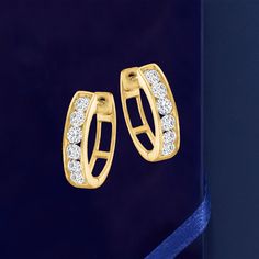 Ross-Simons - .75ct t. w. Diamond Huggie Hoop Earrings in 14kt Yellow Gold. 1/2". The perfect pair - these huggie hoop earrings glitter with .75 ct. t. w. round brilliant-cut diamonds in a just-right size that you'll wear nonstop. Crafted in sunny 14kt yellow gold. Hanging length is 1/2". Hinged post, diamond huggie hoop earrings. Diamond birthstones are the perfect gift for April birthdays. Channel Set Huggie Diamond Earrings For Anniversary, Channel Set Diamond Huggie Earrings For Anniversary, Anniversary Channel Set Huggie Diamond Earrings, Anniversary Huggie Diamond Earrings Channel Set, Anniversary Channel Set Huggie Earrings, Classic Channel Set Huggie Earrings For Anniversary, Channel Set Huggie Hoop Earrings For Anniversary, Yellow Gold Round Huggie Earrings Channel Set, Yellow Gold Channel Set Huggie Earrings