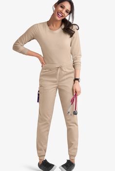 Joggers are the next-best thing to wearing your favorite sweats to work. Our drawstring scrub pants have cargo pockets for maximum storage and a wide knit waistband that is as comfy as it is flattering. Each piece in our Butter-soft Stretch scrub collection was designed for 12+ hour shifts, and made from easy-care, 2-way stretch comfort fabric. • Classic fit • Natural waisted • Knit drawstring waistband • Tapered leg • Jogger • Total of 5 pockets • 2 front pockets • 2 cargo pockets • 1 cell phon Greys Anatomy Men, Scrub Collection, 12 Hour Shifts, Pink Scrubs, Uniform Advantage, Mens Scrubs, Scrub Jackets, Lab Coats, Easy Stretches