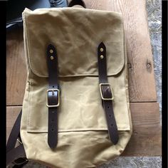 Incredible Canvas Backpack Features Leather Straps With Gold Trim. Securely Snaps At The Closures. Adjustable. Inside Pockets Are Spacious. Brand New- Never Used. From Indy Boutique “Howl + Hide” Price Firm. Comes With Original Howl & Hide Skull Dust Bag. Khaki Waxed Finish Standard Backpack, Khaki Backpack With Waxed Finish, Everyday Backpack With Snap Closure, Standard Backpack With Snap Closure For Daily Use, Khaki Waxed Finish Backpack, Canvas Backpack, Tan Brown, Gold Trim, Backpack Bags