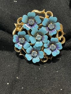 Blue enamel flower brooch, gold tone Avon forget me not, signed Avon. Converts into pendant as well. Blue Flower-shaped Jewelry Brooch, Blue Floral Brooch Jewelry, Coral Color Combinations, Forget Me Not Blue, Flower Bar, Enamel Lapel Pin, Mesa Az, Flower Clip, Enamel Flower