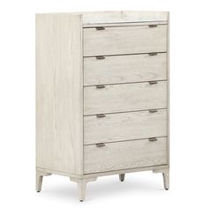 a white chest of drawers with four drawers