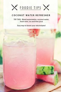 two mason jars filled with watermelon and limeade sitting on top of a cutting board