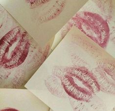 four different pictures of lipstick drawn on paper