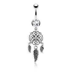 a dangling belly ring with an ornate design and feathers on the end, in silver