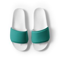 Women's teal slides A must-have for the summer: these women's slides. A pair of these will keep you comfy throughout your day of beach or pool activities, thanks to the cushioned upper strap and the textured footbed.  * Cushioned and durable faux leather upper strap * Lightweight polyurethane (PU) outsole * Contoured, textured footbed * Spot clean only * Printed, cut, and handmade * Blank product sourced from China Important: This product is available in the following countries: United States, C Comfortable Green Non-slip Sandals, Comfortable Green Slide Slippers, Comfortable Non-slip Green Sandals, Casual Green Slip-on Slides, Comfortable Green Synthetic Slippers, Comfortable Green Beach Slippers, Casual Green Slippers For Beach, Casual Green Beach Slippers, Comfortable Green Flip Flops With Textured Footbed