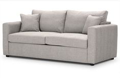 a light gray couch with pillows on the arm and back cushions, in front of a white background