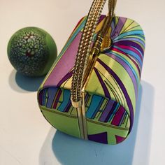 The Ff Sale Back By Popular Demand Unused Pristine 1960s Emilio Pucci Silk Treasure Box Bag . 1 Owner, Pristine Vintage, Coveted, Curated W Care In Climate-Control Smoke-Free Archive . Pucci Is My Forte, She’s My Best . Scoped-For ‘Emilio’-Signed ‘Zadig’ Print, Lavish Lavender Leather Interior Signed ‘Emilio Pucci Italy’ . ‘Emilio’-Script In Print Adds Investment Value, Increasing If Well-Kept . Tarnish-Free Brass Rope Handle, Latch Closure, Frame, 4-Ball Protective Feet Treasure Box Bags Are Si Elegant Multicolor Top Handle Box Bag, Chic Multicolor Evening Bag For Formal Events, Chic Multicolor Evening Bag For Formal Occasions, Retro Multicolor Evening Bag, Retro Rectangular Bag For Events, Multicolor Box Bag For Evening, Retro Rectangular Event Bag, Vintage Multicolor Clutch For Formal Occasions, Emilio Pucci Vintage