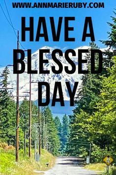 a road with the words have a blessing day on it and trees in the background