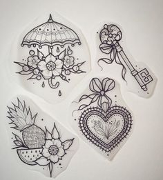 four stickers with different designs on them, one has an umbrella and the other has flowers