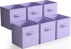 six purple storage bins stacked on top of each other