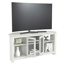 a flat screen tv sitting on top of a white entertainment center