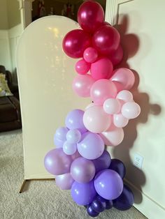 a bunch of balloons that are on the ground