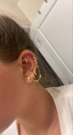 a woman with ear piercings on her ears