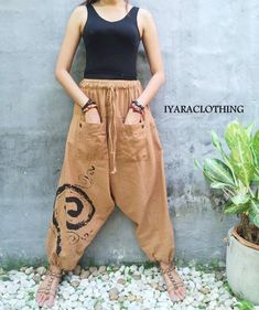 "The harem style trousers made from cotton fabric 100%with an elasticated smock waist and ankles they provide a comfortable lightweight fit, perfect for casual wear, festivals, yoga, holidays as well as pairing with a plain top to get that popular look. D I S C O U N T & P R O M O T I O N ❤ Buy 2 or more items, get 10% off ❤ Buy 4 or more items, get 15% off ENTER the coupon code: IYARA015 ❤ Buy 6 or more items, get 15% off ENTER the coupon code: IYARA020 PLEASE NOTE I can not apply a discoun Work Outfits Frauen, Proper Attire, Harem Pants Men, Bohemian Pants, Festival Pants, Drop Crotch Pants, Harem Pants Women, Black Pants Men, Hippie Pants