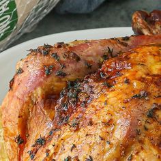 a close up of a chicken on a plate