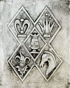 an artistic drawing of four different symbols