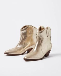 Metallic Gold Leather Cowboy Boots | Oliver Bonas US Best Ankle Boots, Brown Block Heels, Ankle Cowboy Boots, Heels Patterns, Black Leather Chelsea Boots, Gold Boots, Western Ankle Boots, Leather Cowboy Boots, Oliver Bonas