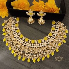 "Gold amritsari kundan is just so perfect! This handcrafted all gold & yellow orange amritsari kundan choker necklace set is no exception.  The earrings are approximately 3 \" long & 1.25 \" wide. Pictures are taken in room light indoors. Please contact if you have any questions. Thanks! Color, shades, texture displayed may slightly vary from the actual product due to digital image limitations. We request you to consider these minor variations. Please expect the possibility of some slight imperfections when buying hand made jewelry. If you have any questions, please contact us." Yellow Jewelry Necklace, Wide Pictures, Kundan Choker Necklace, Indian Choker Necklace, Wedding Necklace Set, Necklace Set Indian, Kundan Choker, Jewelry Set Design, Kundan Set