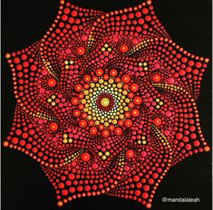 an abstract painting with red and yellow dots in the center, on black paper background