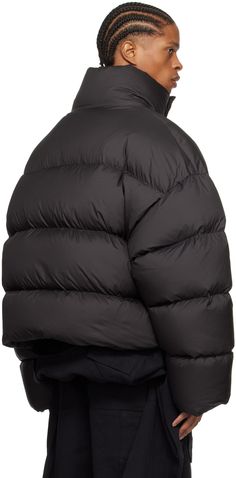 Lightweight down-filled quilted polyester taffeta jacket. · Funnel neck · Zip closure with velcro placket · Welt pockets · Concealed bungee-style drawstring at hem · Concealed rib knit cuffs · Full nylon taffeta lining Fill: 90% duck down, 10% duck feather. Supplier color: Pupil Quilted Nylon Puffer Jacket For Streetwear, Streetwear Quilted Nylon Jacket With Padded Collar, Streetwear Quilted Nylon Puffer Jacket, Black Insulated Nylon Puffer Jacket, Streetwear Nylon Quilted Puffer Jacket, Black Quilted Duck Down Puffer Jacket, Black Nylon Puffer Jacket With Padded Collar, Black Down Quilted Jacket For Outdoor, Black Duck Down Puffer Jacket For Streetwear