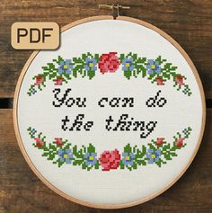 a cross stitch pattern with the words you can do the thing written in red and blue flowers