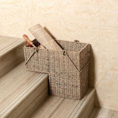 a wicker basket sitting on top of some steps