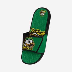 Ready to rep the team with every step? Of course you are. That's why you're checking out these Oregon Ducks Colorblock Big Logo Gel Slides. Keep cool while you show off some fire fan fashion. Features Team-colored design with bold team logo display on footbed so you can step up your game Two-toned strap with team logo display so everyone knows who the face of your franchise is Miniature team logo on back of footbed for even more fandom Gel overlay on footbed to keep your feet feeling as good as Beach Details, Fire Fans, Gel Overlay, Fan Fashion, Logo Display, Oregon Ducks, Keep Cool, Toe Designs, Ducks