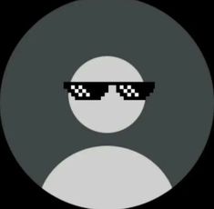 a black and white circle with sunglasses on it's face in front of a dark background