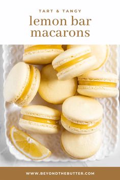 lemon bar macarons on a white plate with text overlay that reads, tart and tangy lemon bar macarons