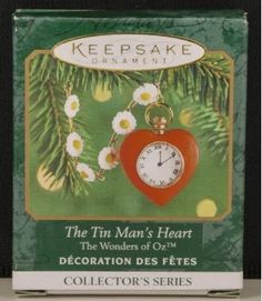 the tin man's heart decoration des fetes collector series keychain is shown