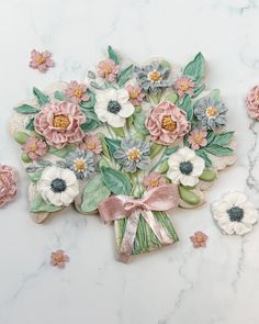 I can’t believe it’s already time to register for add on classes for Reno @cookieconshow tonight! I feel like we were just registering for Austin! I’ll be teaching two classes: Catch the Bouquet and reteaching French Fleurs Here’s a look at my new class! Get ready for wedding season with this life sized bouquet! The cookie itself is over 9”. Then during class, we’ll fill it with some gorgeous royal icing flowers and leaves. We’ll go through each flower during class and then you’ll also go ho... Royal Icing Flowers, Icing Flowers, New Class, Royal Icing, Flowers And Leaves, Life Size, Wedding Season, Reno, Austin